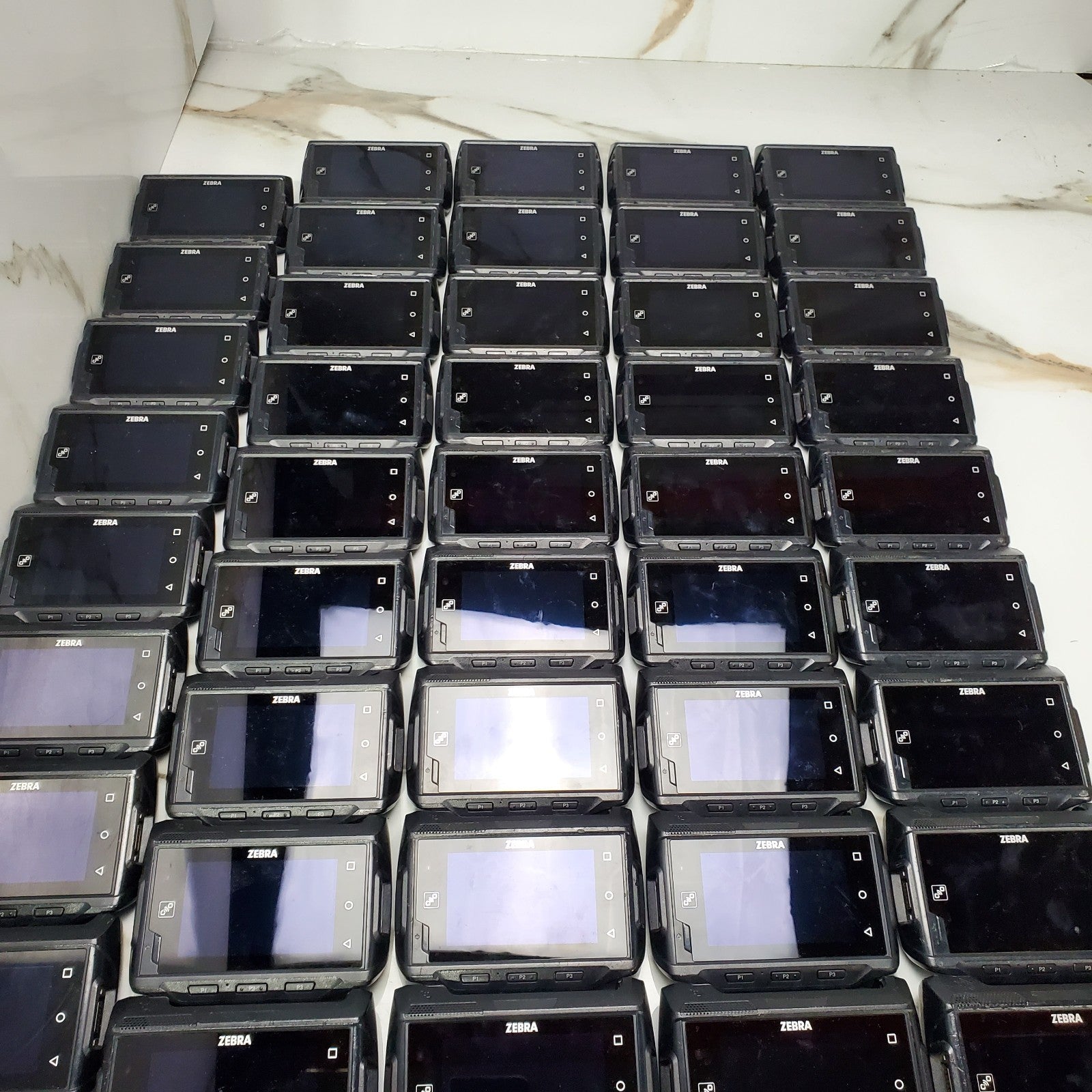(Lot of 54) Zebra Wrist Android Computers WT6000 WT60A0TX2NEUS *FOR PARTS*READ*2